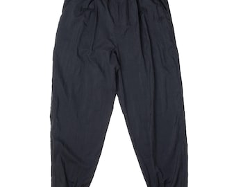 pantalon de survêtement vintage Nike classique en nylon noir avec virgule swoosh fin des années 1980 taille XL