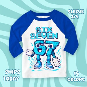 May include: A white and blue raglan-style shirt with blue sleeves. The shirt features the text "SIX SEVEN" in pixelated blue letters, along with animated blue numbers "6" and "7" with arms, legs, and shoes. The shirt has a 3/4 sleeve.