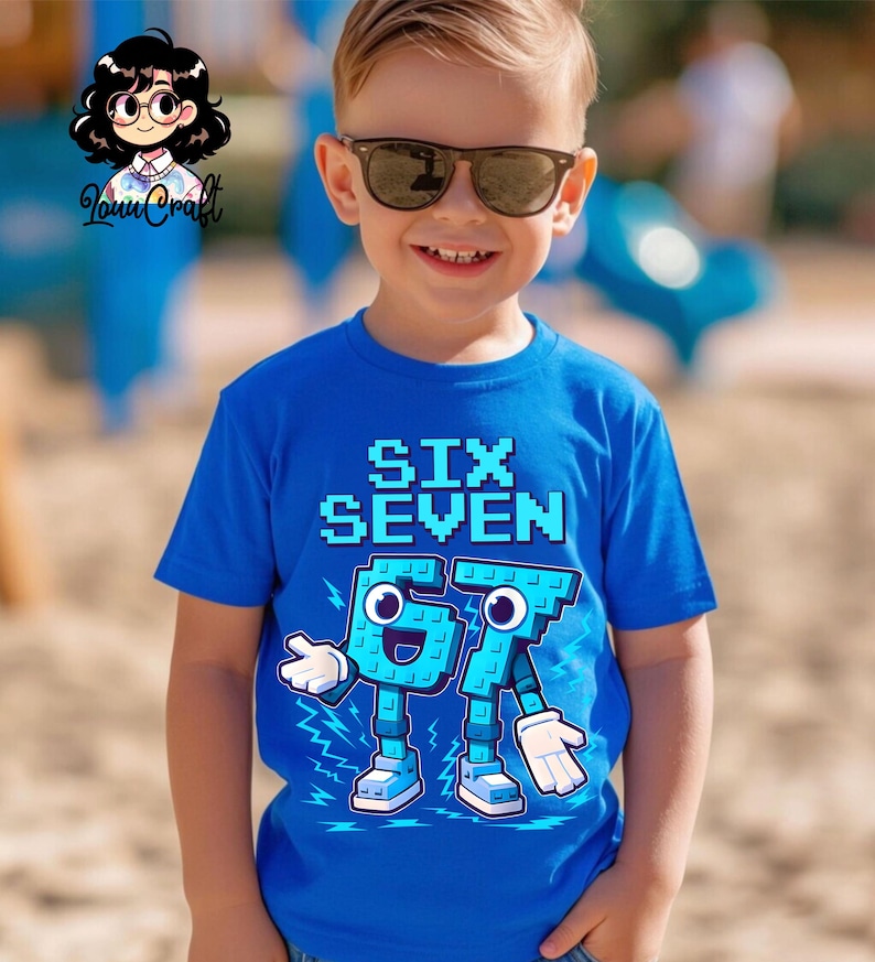 May include: A bright blue t-shirt featuring the text "SIX SEVEN" in a pixelated style. Below, the numbers 6 and 7 are designed as cartoon figures with arms, legs, and smiling faces. The shirt is worn by a child.