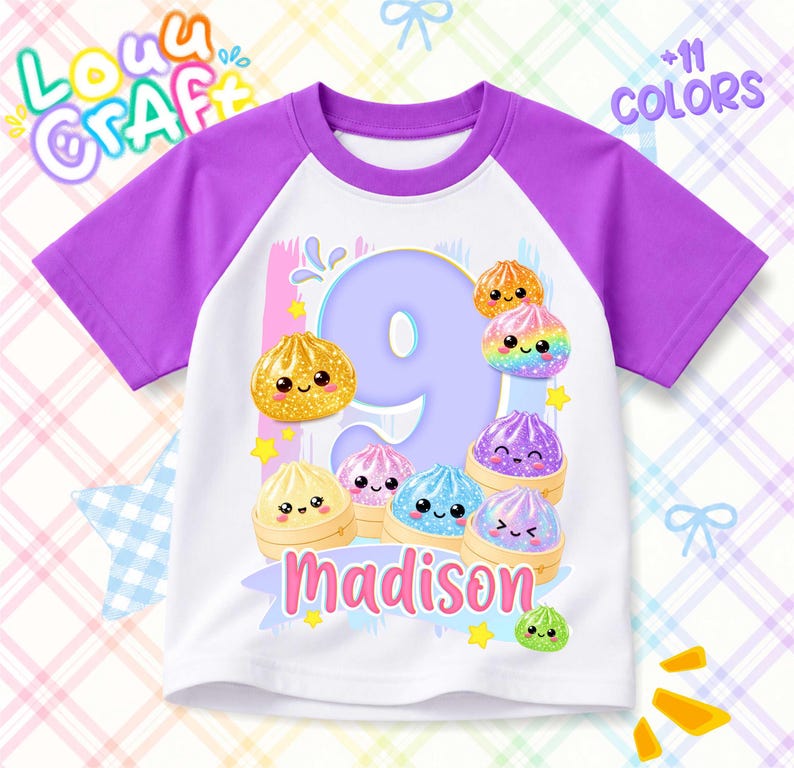May include: A white t-shirt with purple raglan sleeves featuring a large light purple number nine, the name Madison in pink, and several colorful, smiling dumpling illustrations. The design includes small yellow stars and blue accents.