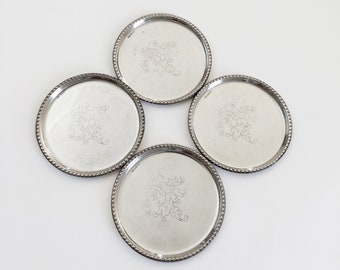 Set of 4 small vintage silver plated plates