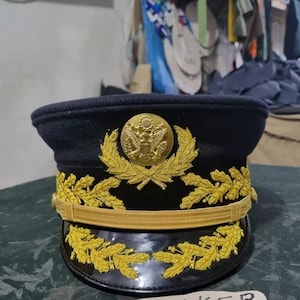 Replica boxed U.S. Army Model 1902 General&#39;s Full Dress Visor Cap.