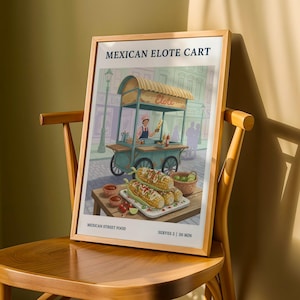 May include: A framed print of a Mexican Elote Cart illustration. The artwork depicts a street food cart with a vendor, corn on the cob, and the text "Mexican Elote Cart" and "Mexican Street Food". The print is displayed on a wooden chair.