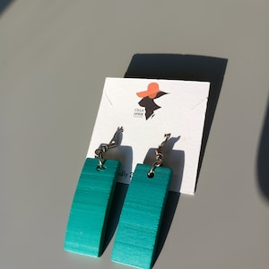 Wood painted earrings. Made from indigenous Zimbabwean misasa, mitondo, mitohwe and mopane tree trees.