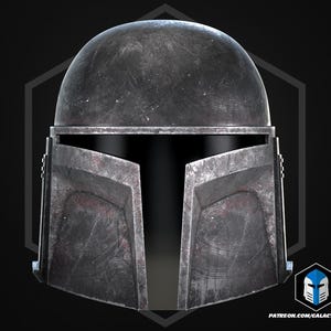 May include: A dark grey, weathered helmet with a T-shaped visor opening. The surface features a metallic, scratched texture throughout. A small logo in the bottom right corner displays a blue and white helmet icon with the text PATREON.COM/GALACTICARMORY.