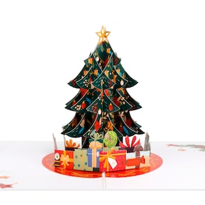 Tarjeta desplegable con árbol de Navidad y regalos
