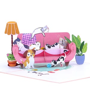 Tarjeta Pop-Up Perro y Gatos jugando en el sofá