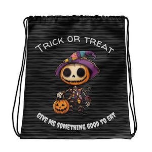 May include: Black drawstring bag with a white striped pattern. It features a cartoon illustration of a skeleton pumpkin holding a jack-o-lantern and the text "Trick or Treat Give Me Something Good To Eat".