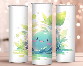 May include: A white tumbler with a green and blue cartoon slime character with a happy face. The slime is surrounded by green leaves and a light blue background.