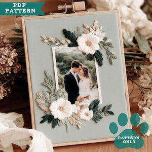 May include: A framed photo with an embroidered floral design. The frame holds a wedding photo, surrounded by white, green, and beige thread flowers and leaves. The text "PDF PATTERN" and "PATTERN ONLY" are visible.
