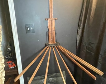 Antique wall wood clothing drying rack