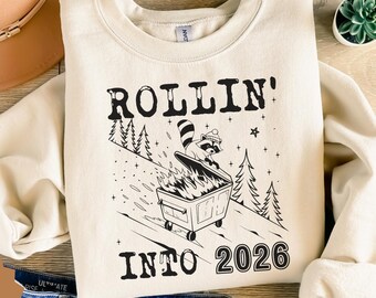 Funny New Year Sweatshirt, New Year 2026 Sweater, Rolling Into 2026 Sweater, Funny Raccoon Shirt, Funny New Year Gift, New Year Funny Shirt