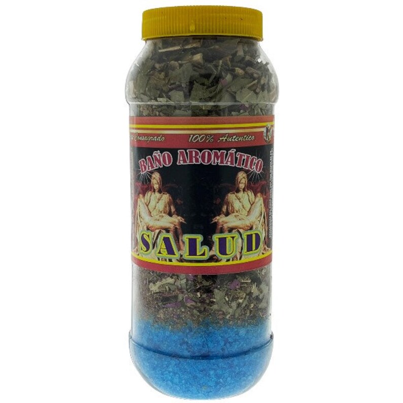 May include: A clear plastic jar with a yellow lid, filled with layers of dried herbs and blue granules. The label reads "BA&Ntilde;O AROM&Aacute;TICO SALUD" with images of figures. The jar is designed for aromatic bath use.