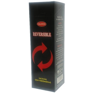 May include: A black box with red text that reads "REVERSIBLE" and a red arrow symbol. The box is labeled "Incienso con Feromonas" and "Olofin".