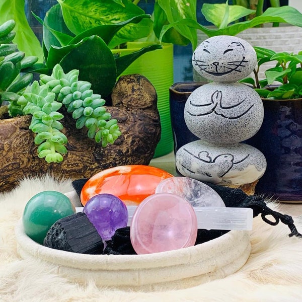 7 Piece Soothing Crystal Energy Set - Includes: 1 Palmstone, 2 Worry Stones, 1 Selenite stick,2 mini spheres,1 Rough Tourmaline and a Pouch