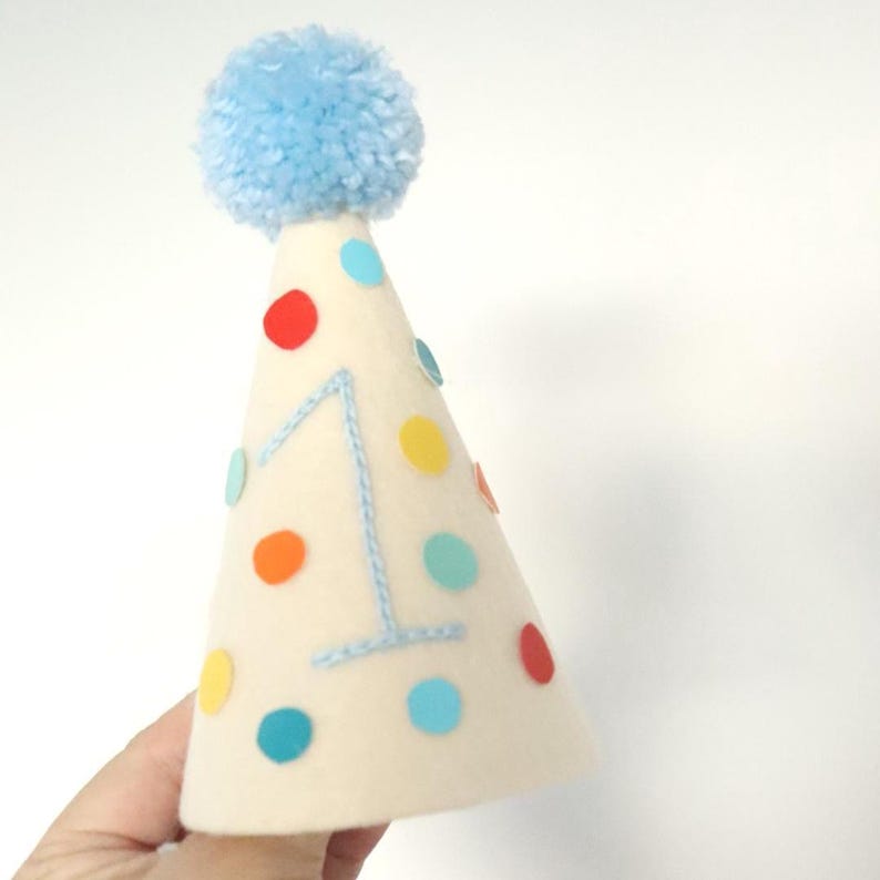Customizable Birthday Crown Baby First Celebration Hat Embroidered Number Options Handmade Felt Material Polka Dot Design Fluffy Pom Decoration Multiple Color Choices Blue Pink White Combinations Trendy Party Accessory Smash Cake