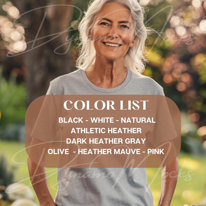 May include: A woman wearing a gray t-shirt with the text "COLOR LIST" and a list of colors: Black, White, Natural, Athletic Heather, Dark Heather Gray, Olive, Heather Mauve, Pink.