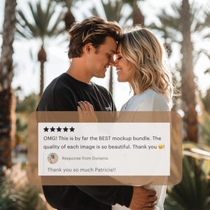 a man and a woman embracing each other in front of palm trees