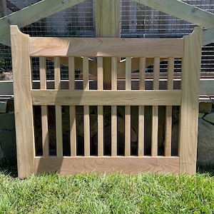 Flat rail outdoor cedar gate with balusters