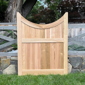 Deep scallop outdoor cedar gate with solid panels