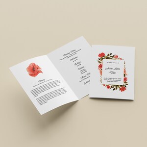 May include: A funeral order of service booklet with a red poppy flower on the front cover. The inside pages include an order of service and a eulogy. The back cover features a floral wreath with the text "In loving memory of Jane Ann Doe 01/01/1900 - 01/01/2000 Loving Mother, Grandmother, Sister, and Friend"