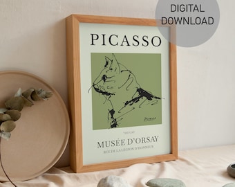 May include: A digital download of a printable art print featuring a black and white line drawing of a cat by Pablo Picasso. The print has a green background and the text "PICASSO", "THE CAT", "MUSÉE D'ORSAY", and "RUE DE LA LÉGION D'HONNEUR" in black text.