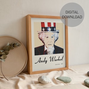 May include: A framed print of a pop art portrait of Uncle Sam by Andy Warhol. The portrait is in red, white, and blue colours. The text below the portrait reads "Andy Warhol (Uncle Sam - 1981)"