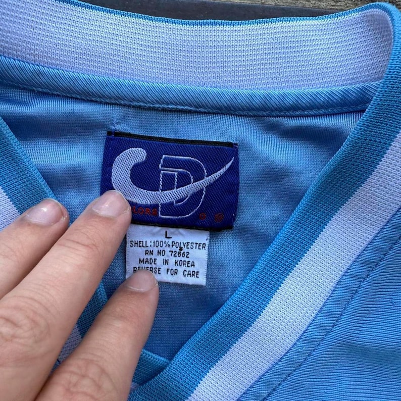 Vintage 90s UNC Tarheels blue basketball jersey size medium Jordan image 3