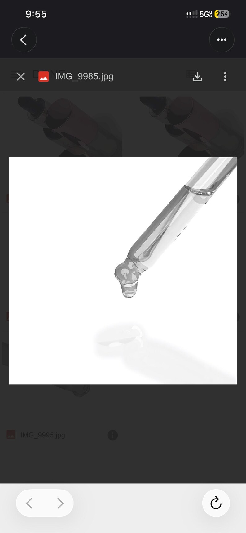 May include: A clear glass dropper with a liquid droplet suspended at the tip. The dropper is angled downwards, with a white background. The image highlights the precision of the tool.