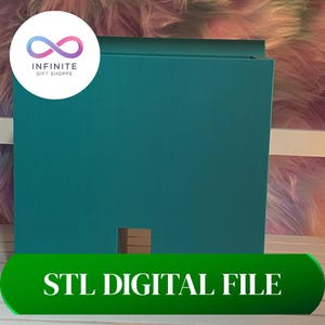 May include: Teal-colored box with a rectangular opening and the text "STL DIGITAL FILE" in white on a green banner. The Infinite Gift Shoppe logo is in the upper left corner. The background is a fuzzy, multi-colored texture.
