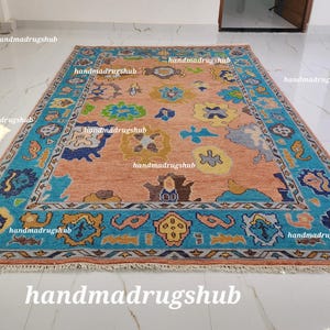 Hand-Knotted Oushak Wool Rug: Orange, Ivory, Blue Accents