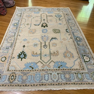 Hand-Knotted Turkish Oushak Wool Rug: Blue & Cream Floral Design
