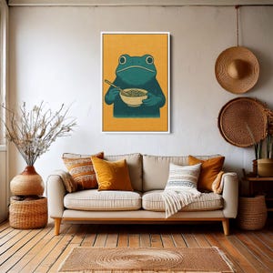 Arte mural de rana caprichosa, ilustración de rana comiendo ramen, póster divertido de animales para la cocina o la habitación de los niños.