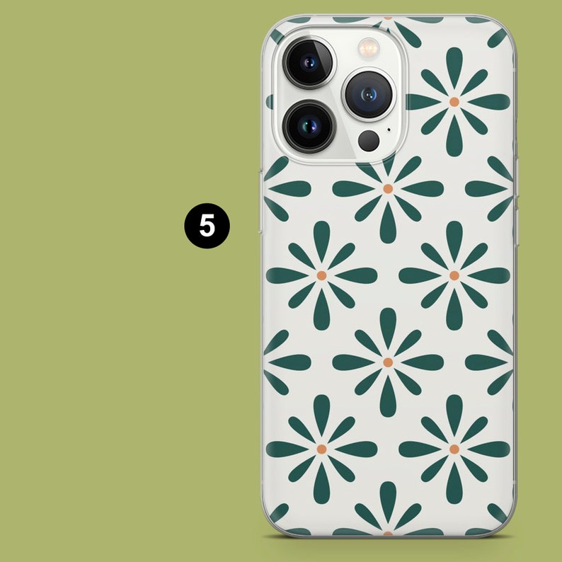 Op de afbeelding: Een witte telefoonhoes met een groen en oranje bloemenpatroon. De hoes heeft een transparante achterkant en een witte rand.