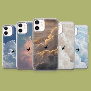 May include: Five different phone cases featuring a cloudy sky and birds in flight design. The cases are clear and showcase the design through the back of the case.