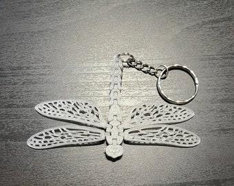 Porte clefs libellule phosphorescent