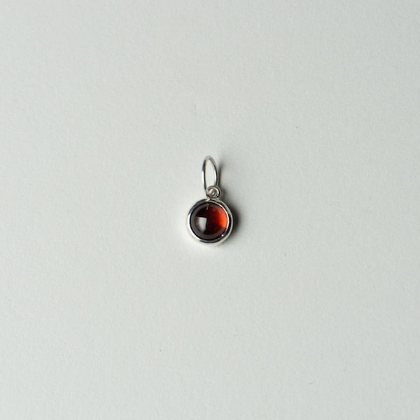 Magnolia red garnet pendant in recycled sterling silver