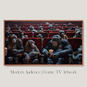 May include: A framed photograph of a group of chimpanzees sitting in a movie theater, watching a film. The chimpanzees are dressed in casual clothing and are holding popcorn and drinks. The image is titled "Modern Audience | Frame TV Artwork".