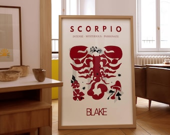 以下が含まれることがあります： 赤い蠍座のデザインが施されたフレーム入りアートプリント。「SCORPIO」、「BLAKE」、そして「INTENSE MYSTERIOUS PASSIONATE」の文字が特徴です。デザインには、様式化されたサソリのイラストが含まれています。