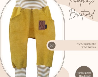 Pump pants, wax pants, rib jersey, mustard yellow, label