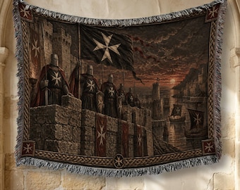 May include: A woven tapestry featuring a scene of armored knights standing on a stone castle wall at sunset. The knights wear helmets and capes adorned with the white Maltese cross. A flag with the same cross flies above, with ships in the water.