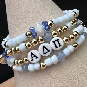 ALPHA DELTA PI Blue, White, & Gold Beaded Stretch Bracelet Stack Tarnish Resistant with Diamond Accent Bead