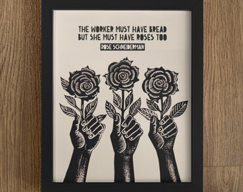 May include: Black and white print of three hands holding roses with the text "The worker must have bread but she must have roses too" and "Rose Schneiderman" below the roses.