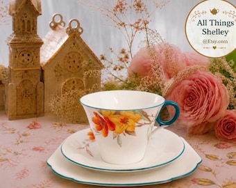 Vintage Shelley Regent theetrio uit 1925, gemaakt van fijn porselein (bone china) | Geel Syringa-patroon | Theekopje, schotel en bord | Gemaakt in Engeland