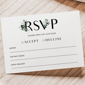May include: RSVP card with a floral design and the text "RSVP" in black. The card has lines for names, dietary needs, and song requests. The text "Please reply by 18.07.2025" is below the floral design. The options "Accept" and "Decline" are below the text.