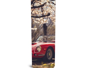Classic Red Ferrari Spider Convertible Among the Cherry