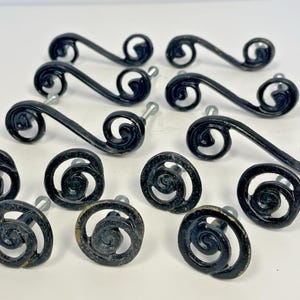 May include: A set of three ceramic mugs with a speckled, matte finish. The mugs are in shades of cream, light gray, and dark gray. Each mug has a simple, minimalist design, perfect for coffee or tea.