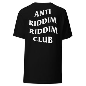 May include: Black t-shirt with white text that reads "ANTI RIDDIM RIDDIM CLUB" on the back.