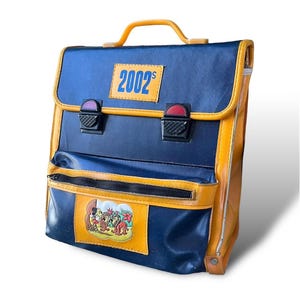 cartable en cuir vintage, cartable des années 1970, cartable en cuir avec bretelles, sac à dos d'école rétro génial