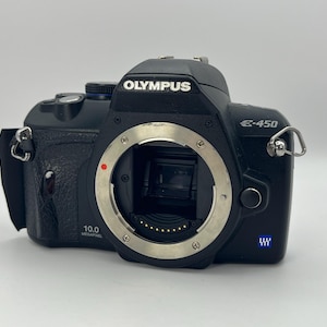 Olympus E-450 DSLR-camerabehuizing – voor onderdelen of reparatie – geen batterijklepje – niet-werkende staat